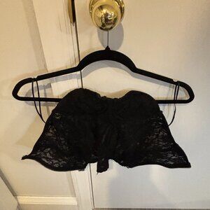 Black Edikted corset-style cropped tee with a fitted, structured silhouette